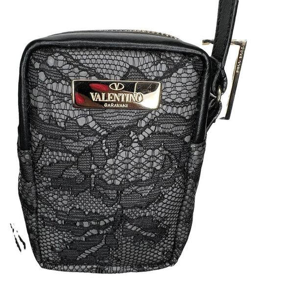 NWT Valentino Garavani lace mini bag. Valentino logo outside. Zipper on top. 3x4